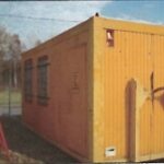 Büro- & Magazincontainer mit Regaleinbauten 6,0m x 2,5m x 2,5m Orange